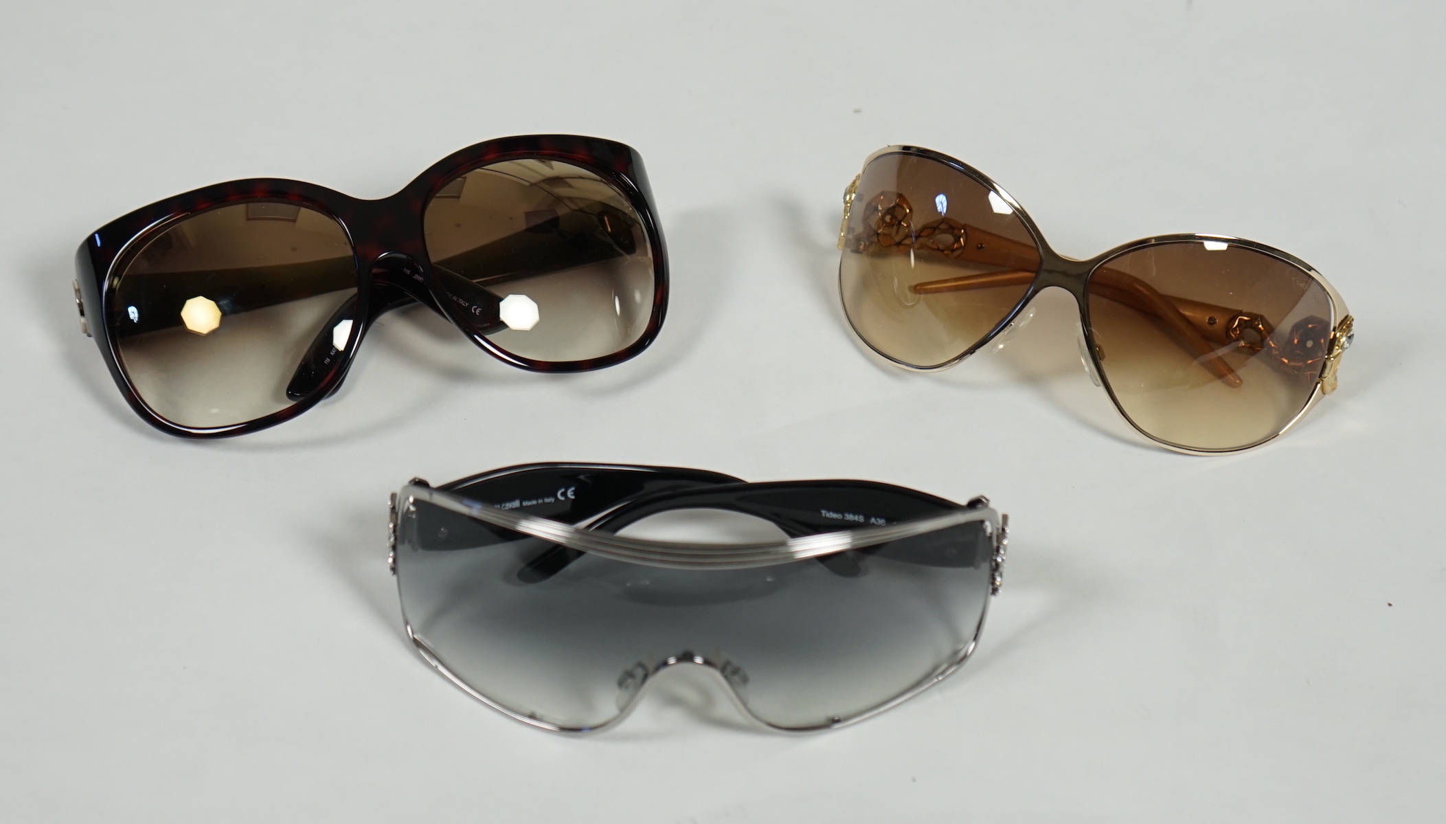 Two pairs of Roberto Cavalli and one pair of Jimmy Choo lady's sunglasses